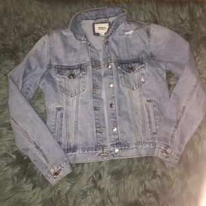 Distressed light wash denim jacket